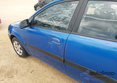 2009 Kia Rio Lx from USA, damaged, VIN KNADE223296462203